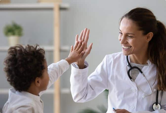 Doctor and patient high fiving